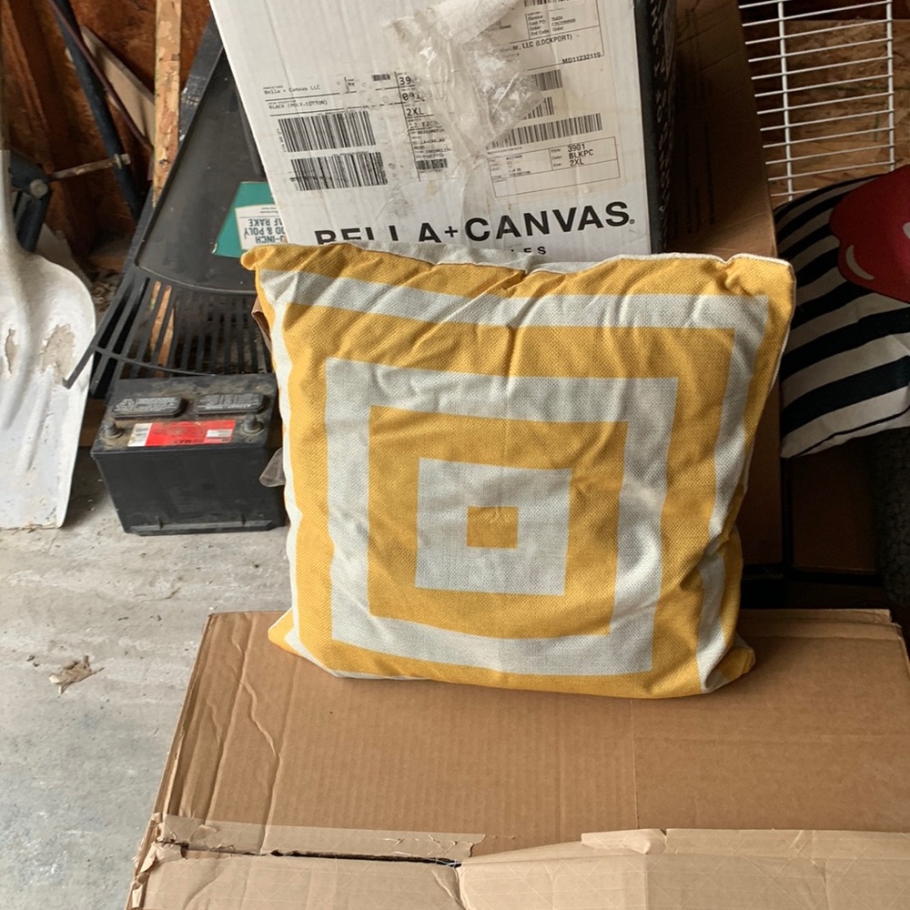Yellow throw pillow